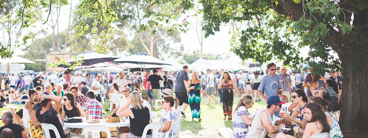 people enjoying themselves at a regional food and wine festival