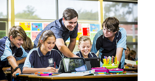 Teacher and students at school