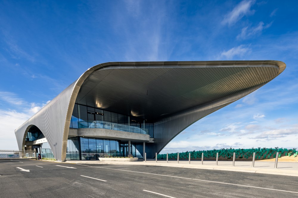 The newly contrcted terminal in Queenscliff - displaying a rounded design constructed in steel an featuring large glass windows