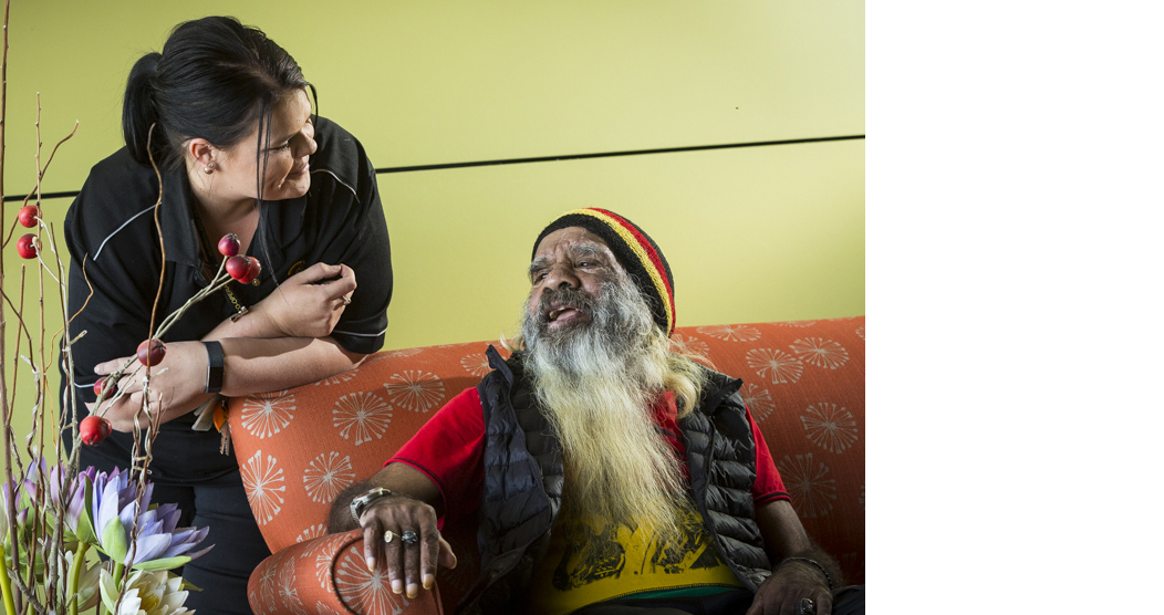 Man and woman talking and smiling