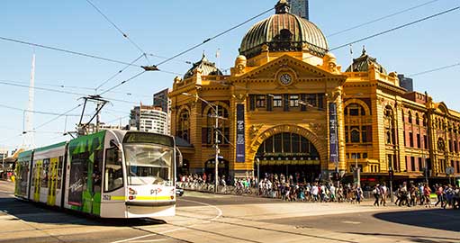 Flinders Street Station with a tram in the foreground