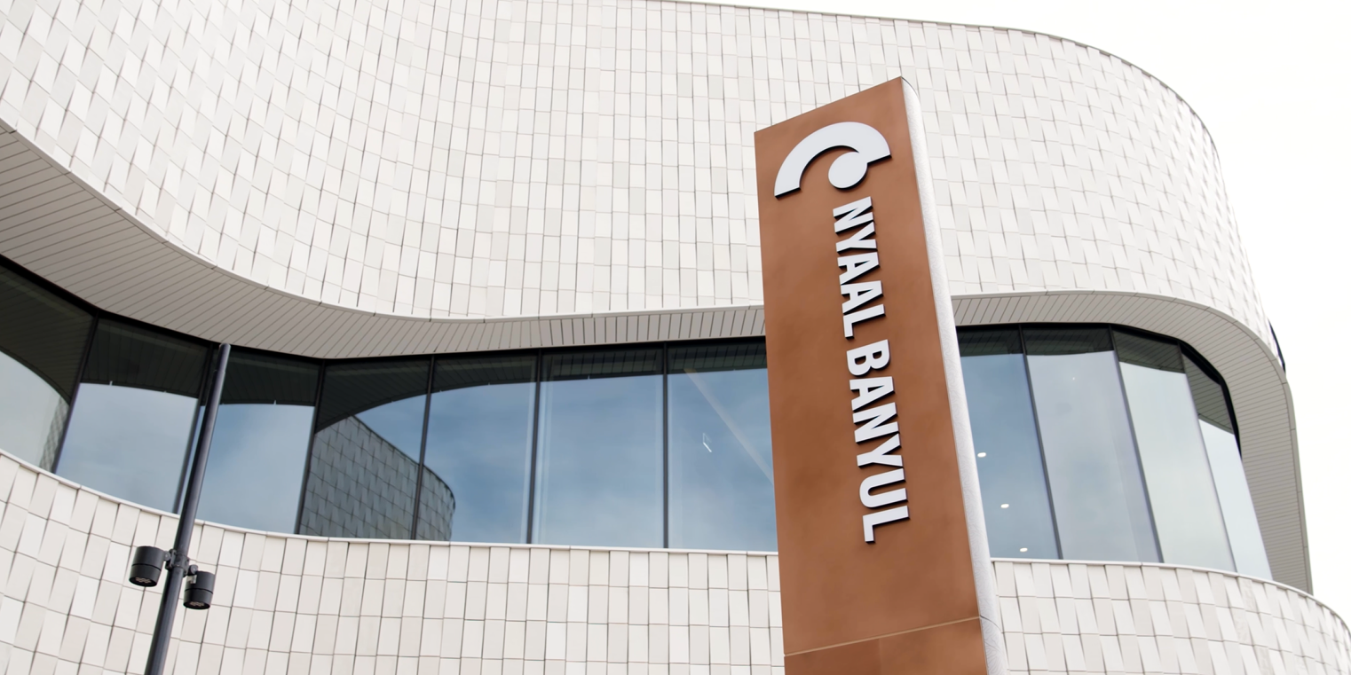 A picture of a sign saying Nyaal Banyul at the main entrance to the venue