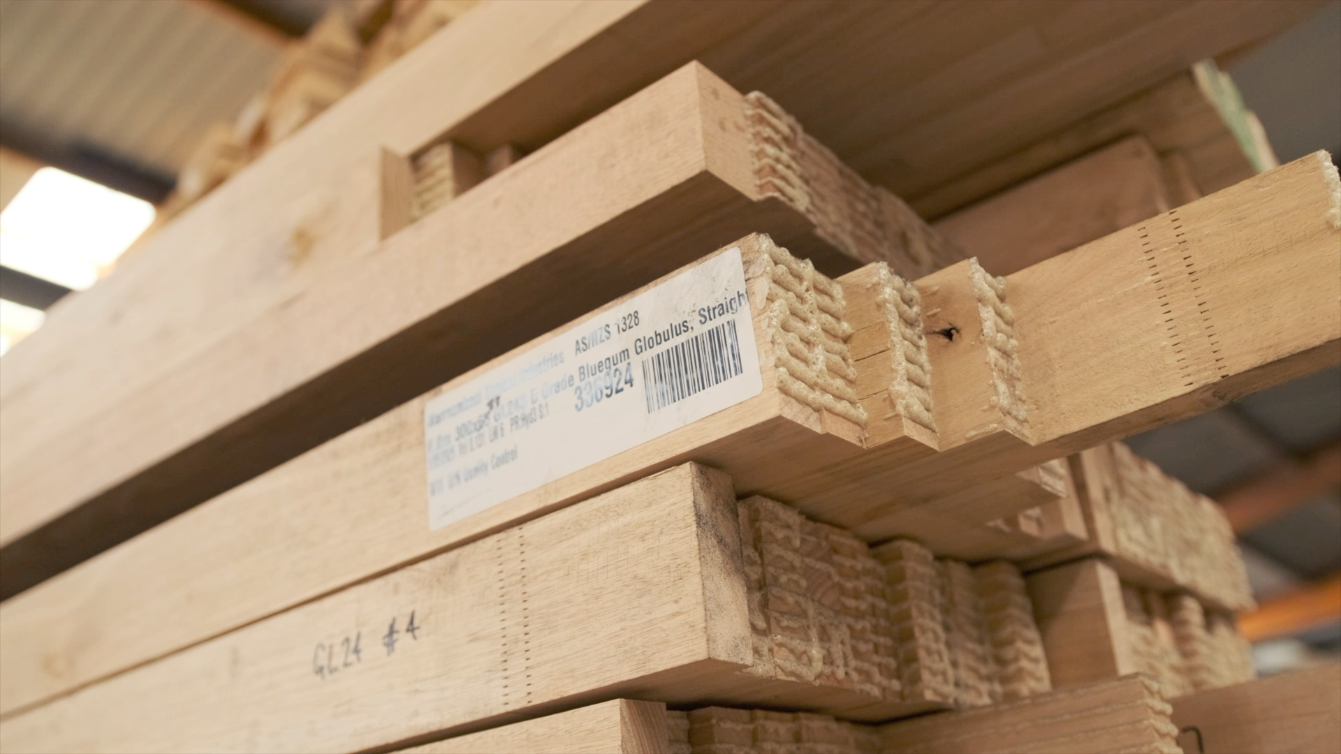 A pile of timber beams.
