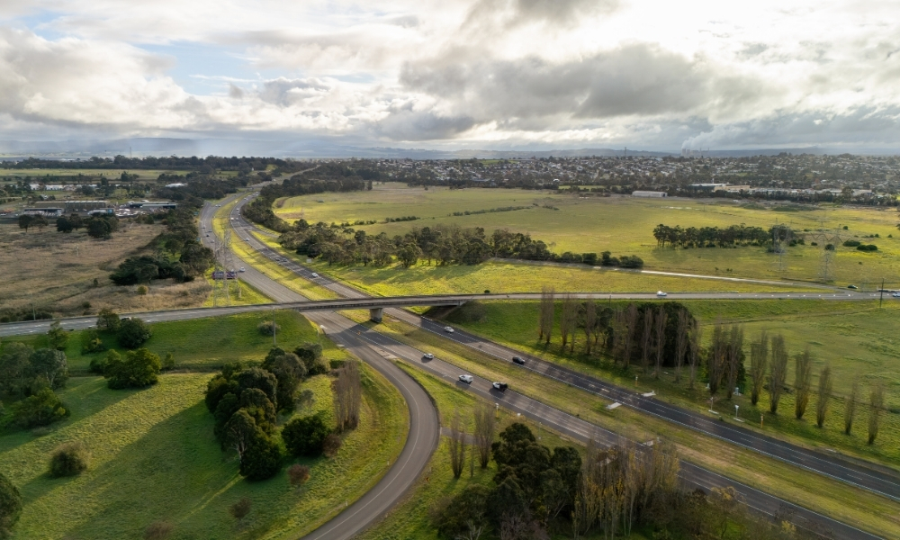The 69-hectare GLaMP, seen behind the Princes Freeway, is offering serviced land for businsses looking to grow or establish their regional footprint. Drone view of the Gippsland Logistics and Manufacturing Precinct, taken from over the Princes Freeway.