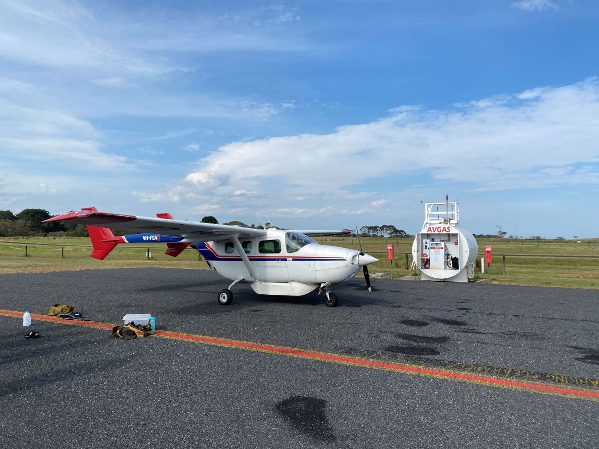 A plane being refuelled on the tarmac